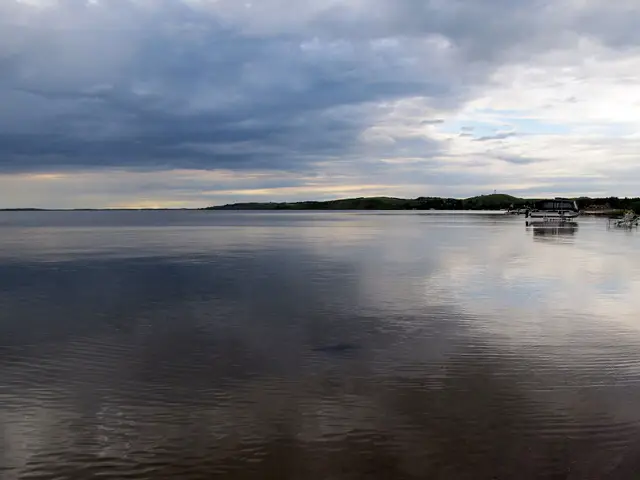 Calm waters on the lake at dusk
